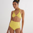 "Front view of the Gunnel Yellow Bikini Top, featuring a U-front neckline, ruched detailing, and ABS chain straps."