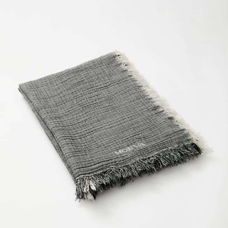 Ibiza Black/Ecru Towel | Moeva | Towel | Each week unveils new pieces—luxury swimwear, fluid resort silhouettes, and elevated summer-to-evening essentials designed to carry you from coastal escapes to city nights.