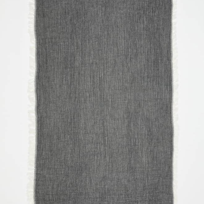 Ibiza Black/Ecru Towel | Moeva | Towel | Each week unveils new pieces—luxury swimwear, fluid resort silhouettes, and elevated summer-to-evening essentials designed to carry you from coastal escapes to city nights.