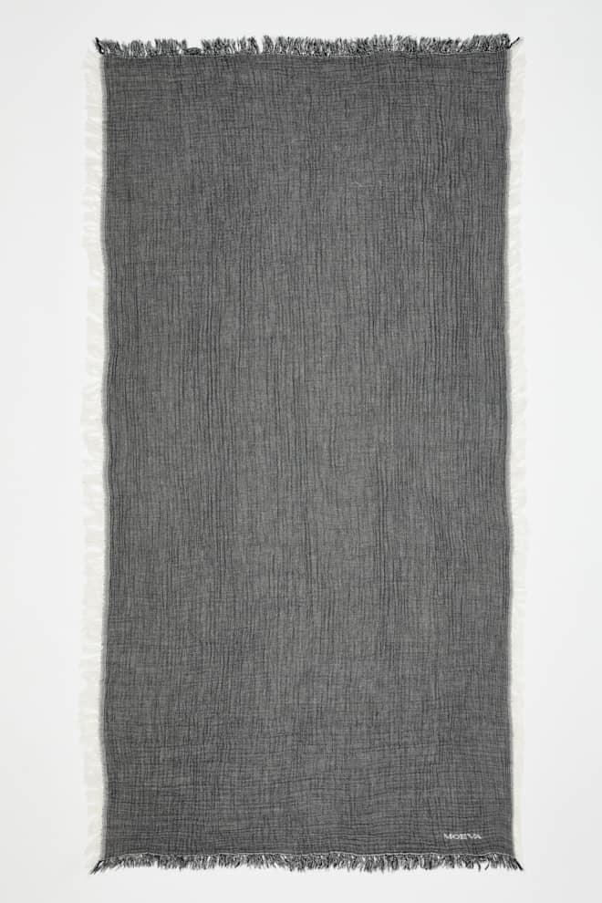 Ibiza Black/Ecru Towel | Moeva | Towel | Each week unveils new pieces—luxury swimwear, fluid resort silhouettes, and elevated summer-to-evening essentials designed to carry you from coastal escapes to city nights.