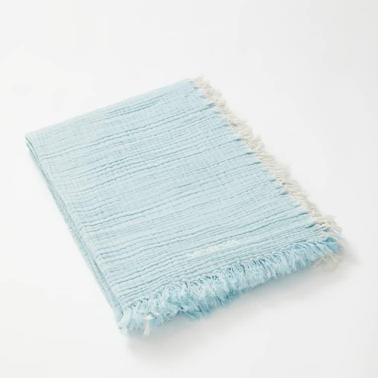 Ibiza Blue/Ecru Towel | Moeva | Towel | Each week unveils new pieces—luxury swimwear, fluid resort silhouettes, and elevated summer-to-evening essentials designed to carry you from coastal escapes to city nights.