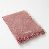 Close Up View of Ibiza Red Ochre/Ecru Towel  -  Super Absorbent, Quick Drying, Cotton Beach Towel, MOEVA Luxury Swimwear   