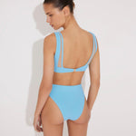 Back View: Model in Ilari Blue Bikini Bottom - High-Waisted Swim Bottom, Moderate Bottom Coverage, Lined, Italian Fabric, Special Lycra Xtralife Certificate, MOEVA Luxury Swimwear  