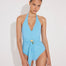 Front View of Model Wearing Imelda Blue Swimsuit - MOEVA Luxury Swimwear, Halter Neck, Tie Neck, V Neckline, Draped Front Piece Detail, Removable Padding One Piece Women's Swimwear, Twisted Gold Accessory, MOEVA Luxury Swimwear   