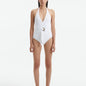 Front View of Model Wearing Imelda Imelda White Swimsuit - MOEVA Luxury Swimwear, Halter Neck, Tie Neck, V Neckline, Draped Front Piece Detail, Removable Padding One Piece Women's Swimwear, Twisted Gold Accessory, MOEVA Luxury Swimwear   