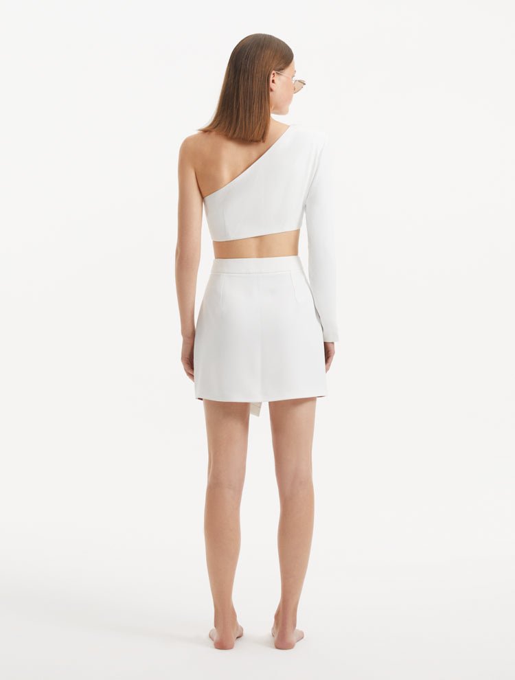 "India White/Brown Skort viewed from the back, highlighting its clean lines and high-rise waist. "