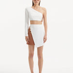"India White/Brown Skort from the front, showcasing its high-rise waist and color block effect with a muted brown panel against a crisp white base."