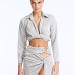 Front View: Model wearing Greta Silver Shirt and Indigo Skirt - High Waist, Metallic Fabric, Chic Mini Skirt, MOEVA Luxury Beachwear