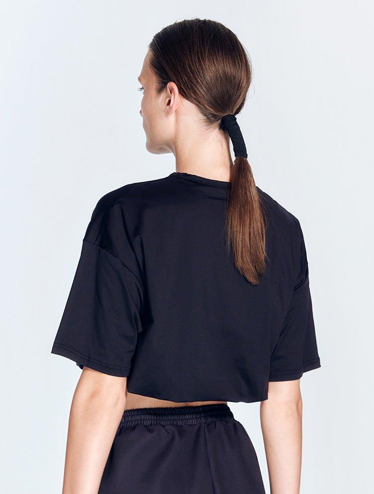 Isolde Black Top | Moeva | Activewear | Each week unveils new pieces—luxury swimwear, fluid resort silhouettes, and elevated summer-to-evening essentials designed to carry you from coastal escapes to city nights.