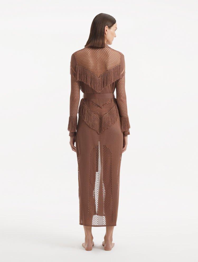 "Side view of the Itzel brown kaftan, highlighting its flowing, ankle-length silhouette, playful fringes, and versatile self-tie belt, capturing the relaxed and stylish fit."