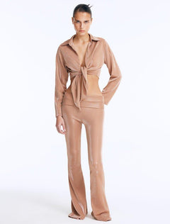 Front View: Model in Izara Bronze Pants - Regular Waist, Metallic Fabric, Chic Ankle-Length Pants, MOEVA Luxury Ready to Wear