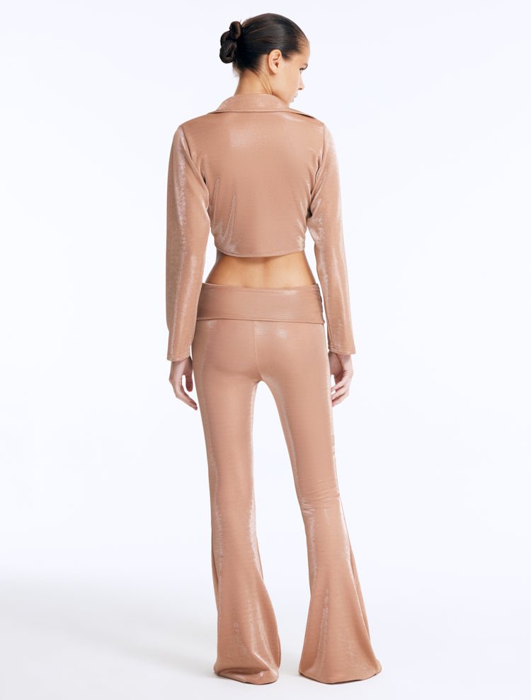 Back View: Izara Bronze Pants on Model - Flared Slim Fit, Fold Over Waistband, Stylish Pants, MOEVA Luxury Ready to Wear
