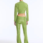 Izara Green Mid-Rise Flared Pants | Moeva | Women Beachwear Pants | Each week unveils new pieces—luxury swimwear, fluid resort silhouettes, and elevated summer-to-evening essentials designed to carry you from coastal escapes to city nights.