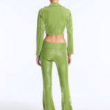 Izara Green Mid-Rise Flared Pants | Moeva | Women Beachwear Pants | Each week unveils new pieces—luxury swimwear, fluid resort silhouettes, and elevated summer-to-evening essentials designed to carry you from coastal escapes to city nights.