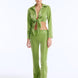 Izara Green Mid-Rise Flared Pants | Moeva | Women Beachwear Pants | Each week unveils new pieces—luxury swimwear, fluid resort silhouettes, and elevated summer-to-evening essentials designed to carry you from coastal escapes to city nights.