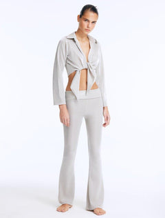 Front View: Model in Izara Silver Pants - Regular Waist, Metallic Fabric, Chic Ankle-Length Pants, MOEVA Luxury Ready to Wear