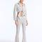 Front View: Model inGreta Silver Shirt and Izara Pants- Regular Waist, Metallic Fabric, Chic Ankle-Length Pants, MOEVA Luxury Ready to Wear