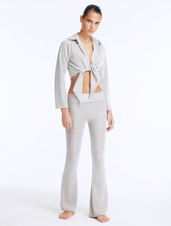 Front View: Model in Izara Silver Pants - Regular Waist, Metallic Fabric, Chic Ankle-Length Pants, MOEVA Luxury Ready to Wear