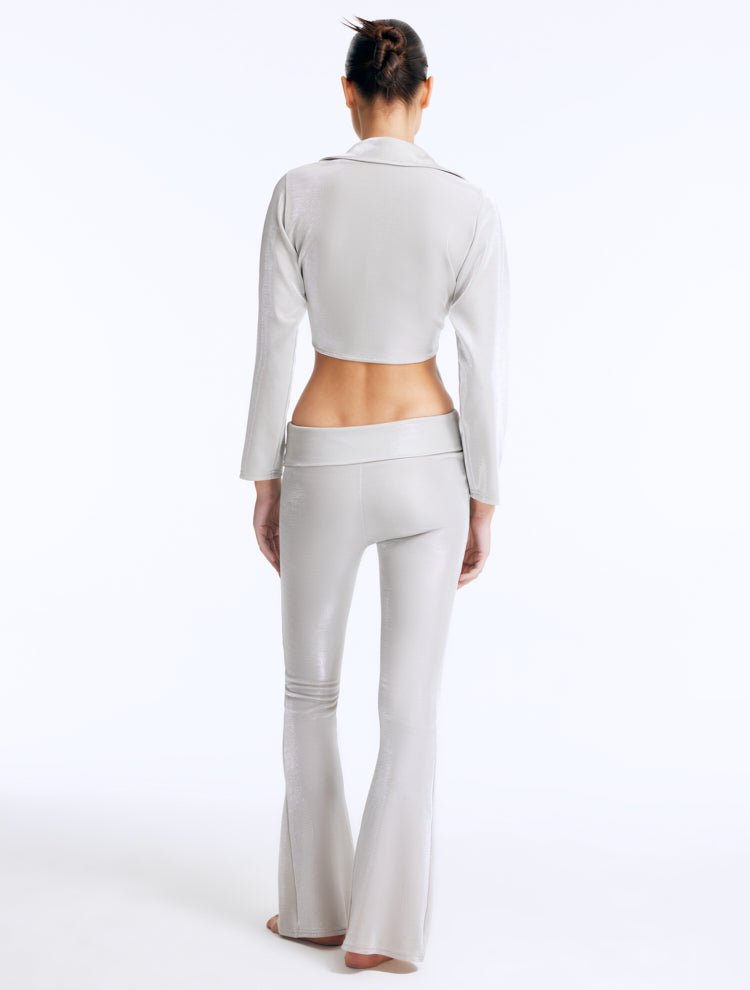 Back View: Izara Silver Pants on Model - Flared Slim Fit, Fold Over Waistband, Stylish Pants, MOEVA Luxury Ready to Wear