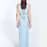 "Back view of the Izzy Baby Blue Dress highlighting its ankle-length silhouette, sleeveless top, and semi-sheer knit fabric with intricate stripe details."