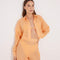 Jacinta Orange Cropped Sheer Long Sleeve Shirt | Moeva | Beachwear Tops | Each week unveils new pieces—luxury swimwear, fluid resort silhouettes, and elevated summer-to-evening essentials designed to carry you from coastal escapes to city nights.