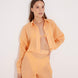 Jacinta Orange Cropped Sheer Long Sleeve Shirt | Moeva | Beachwear Tops | Each week unveils new pieces—luxury swimwear, fluid resort silhouettes, and elevated summer-to-evening essentials designed to carry you from coastal escapes to city nights.