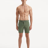 "Front view of Jack army green swim shorts with side fasteners and buttoned back pockets"