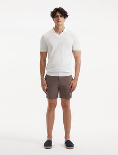 "Front view of a model wearing Jack brown swim shorts, showcasing the modern slim fit and quick-dry fabric"