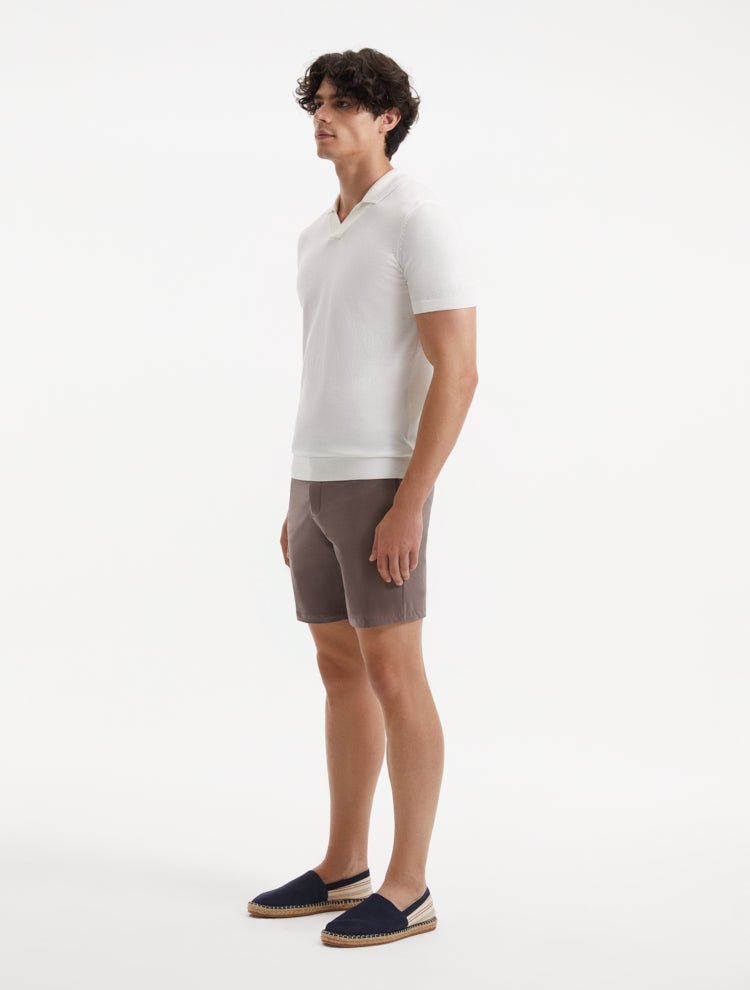 "Side view of Jack brown swim shorts with front slash pockets and stylish buckles"