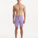 "Front view of Jack lilac swim shorts highlighting the slim fit, snap and zip fastening, and stylish buckles"