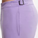 "Close-up of Jack lilac swim shorts showing the quick-dry fabric, adjustable buckles, and front slash pockets"