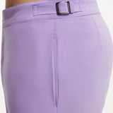 "Close-up of Jack lilac swim shorts showing the quick-dry fabric, adjustable buckles, and front slash pockets"
