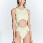 "Model wearing the Jackie Yellow Swimsuit from the front, showcasing the high leg cut and twist knot detail."