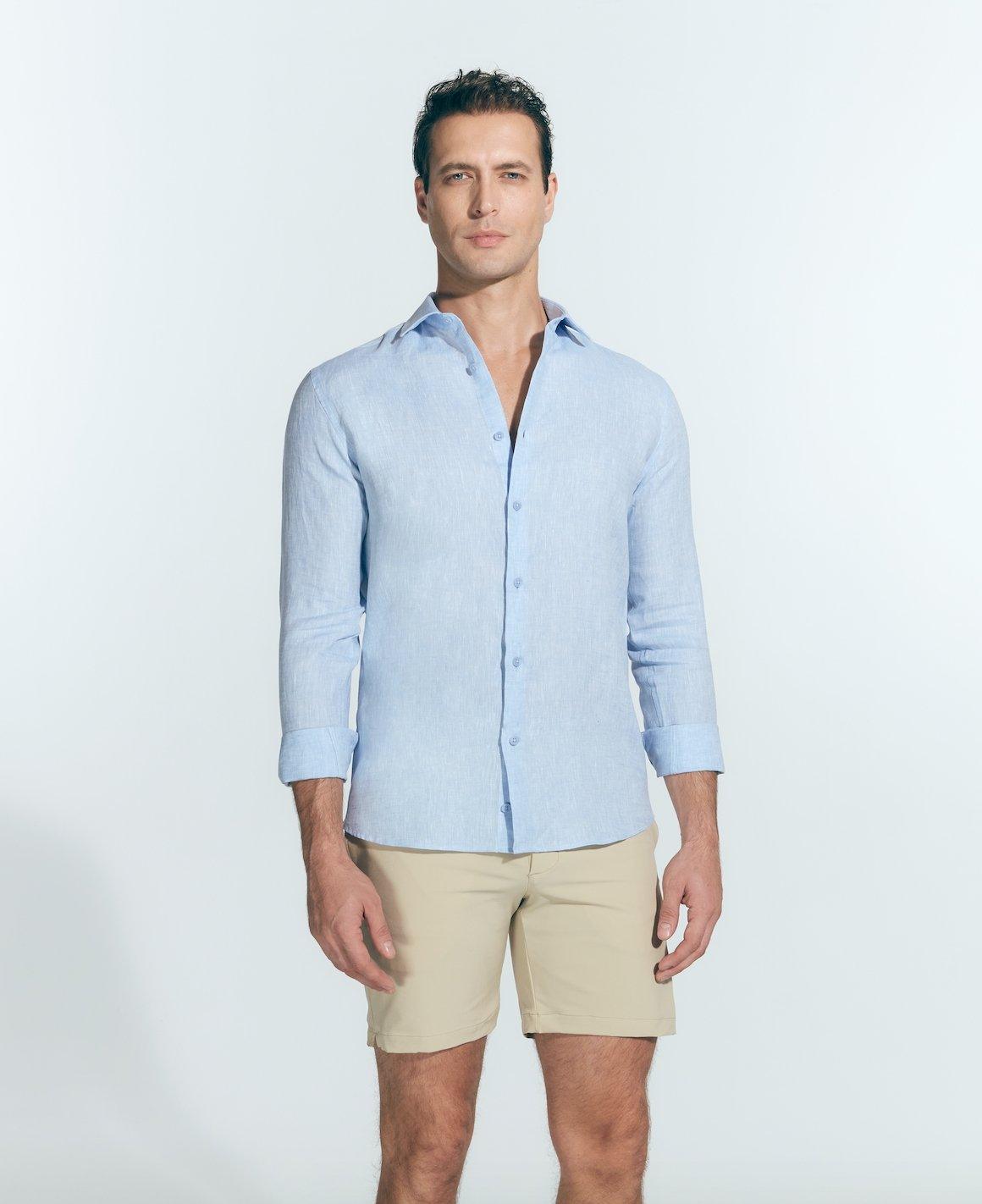 Front View: Model in James Baby Blue Shirt - MOEVA Luxury Swimwear, Spread Collar, Buttoned Cuffs, Button Fastening, Long-Sleeved, Slim Fit, MOEVA Luxury Swimwear