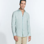 Front View: Model in James Green Shirt - MOEVA Luxury Swimwear, Spread Collar, Buttoned Cuffs, Button Fastening, Long-Sleeved, Slim Fit, MOEVA Luxury Swimwear