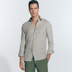 Front View: Model in James Khaki Shirt - MOEVA Luxury Swimwear, Spread Collar, Buttoned Cuffs, Button Fastening, Long-Sleeved, Slim Fit, MOEVA Luxury Swimwear