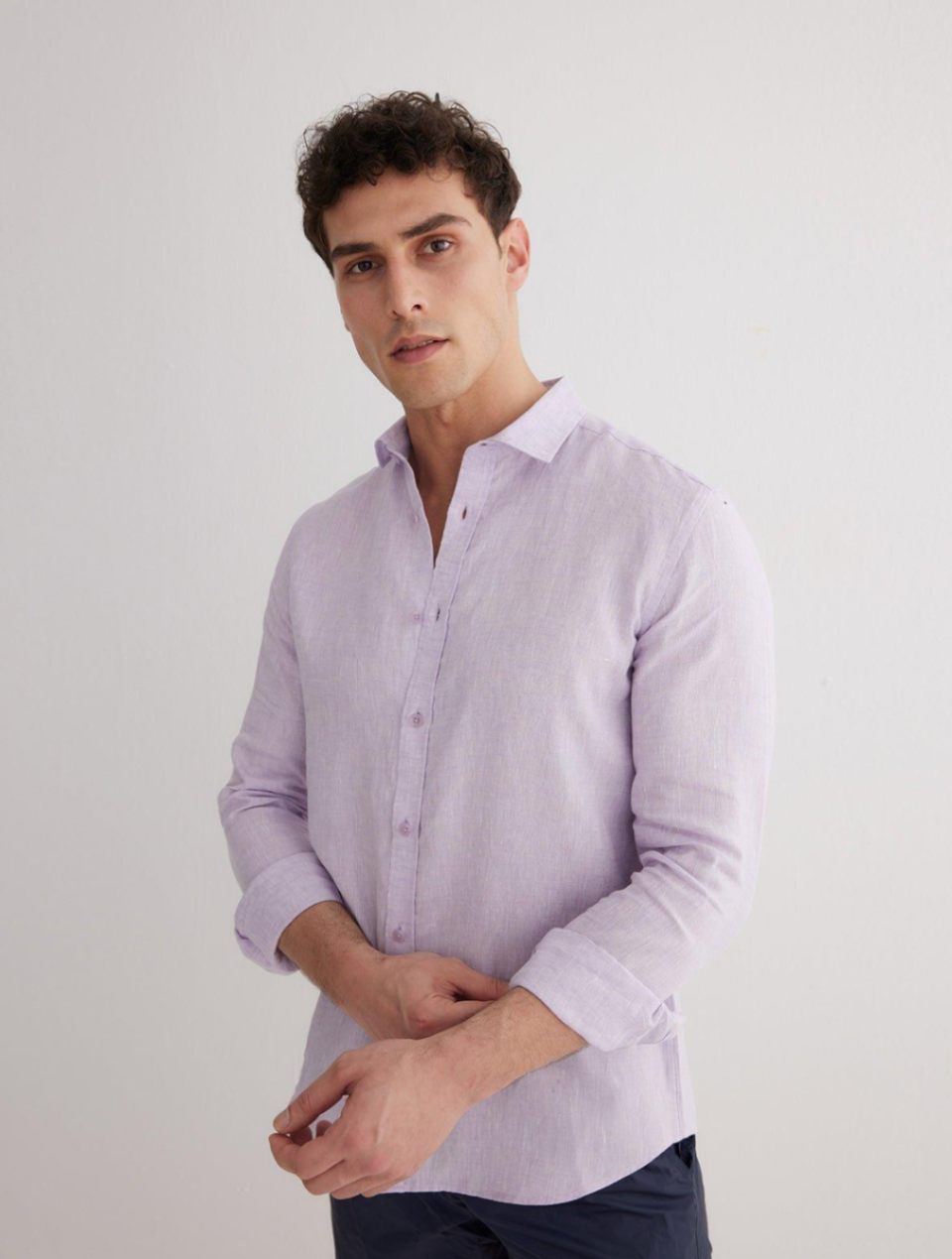 Front View: Model in James Lilac Shirt - MOEVA Luxury Swimwear, Spread Collar, Buttoned Cuffs, Button Fastening, Long-Sleeved, Slim Fit, MOEVA Luxury Swimwear