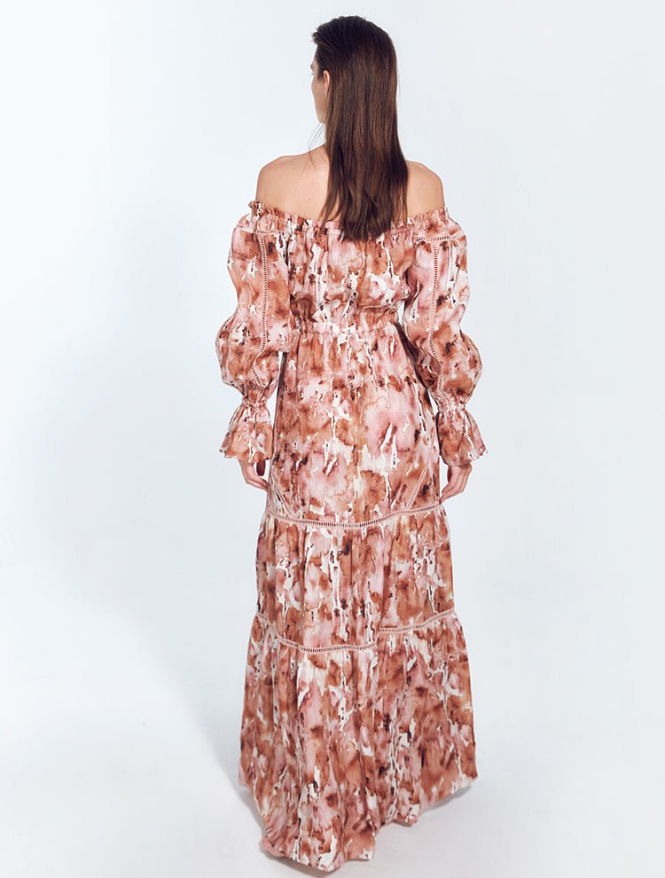 Back View: Model in Jealine Floral Abstract Dress - MOEVA Luxury Swimwear, Embroidery Details, Off-The-Shoulder Neckline, Ready to Wear, Unlined, Comfort, Linen, MOEVA Luxury Swimwear