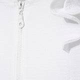 Close-up of the ruffle detailing and fabric texture, illustrating the playful design elements.