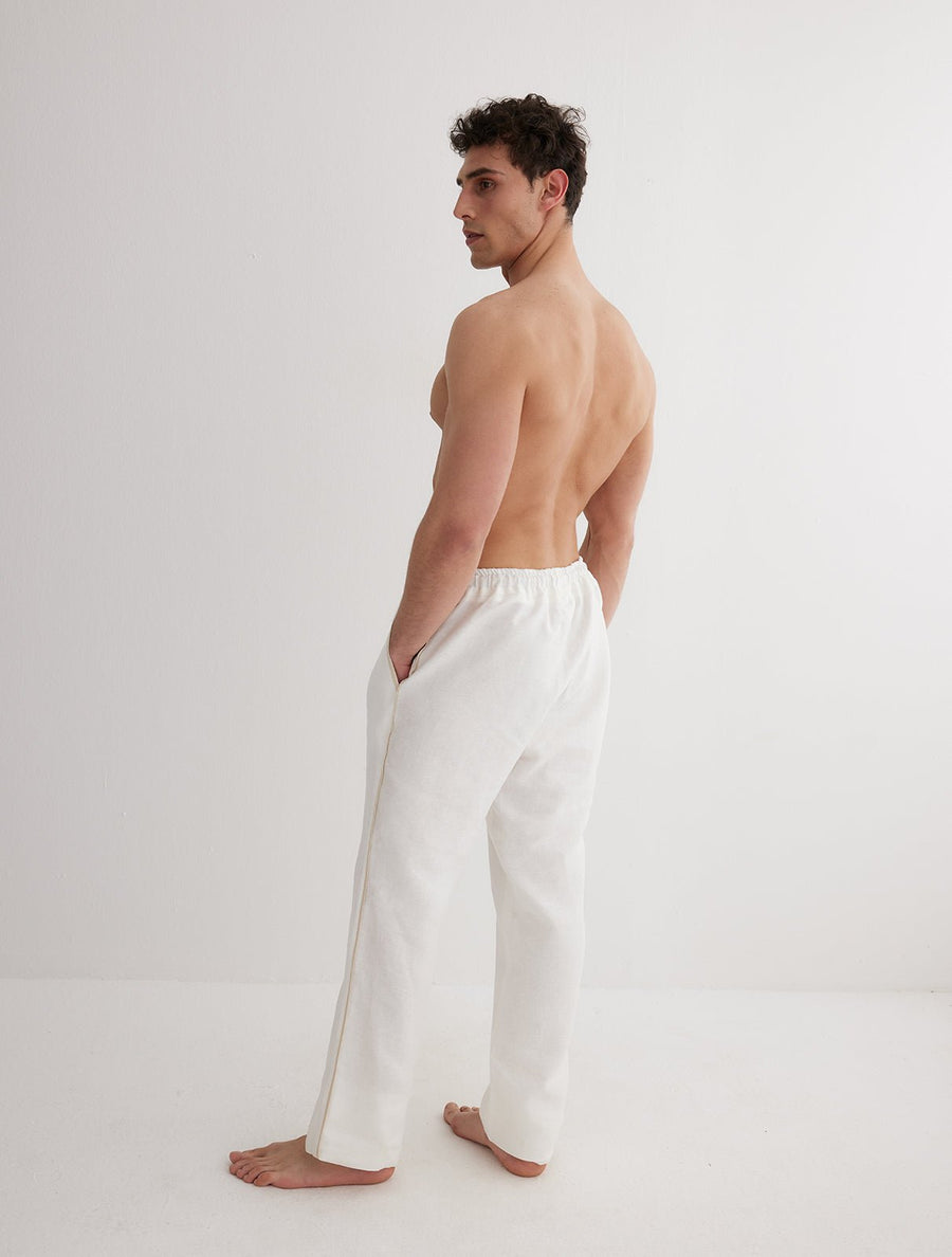 Back View: Model in Joseph White Pants - MOEVA Luxury Swimwear, Ready to Wear, Nikel Pants, Unlined, Relaxed Fit, %100 Linen, MOEVA Luxury Swimwear