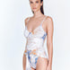 "Model wearing the Kai Blue Abstract Swimsuit from the front, showcasing the underwired top and high-cut leg design."