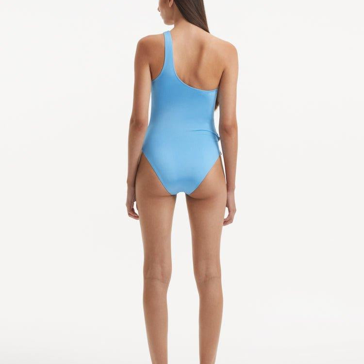 Kaimana Baby Blue One Shoulder Satin Swimsuit | Moeva | Swimsuit | Each week unveils new pieces—luxury swimwear, fluid resort silhouettes, and elevated summer-to-evening essentials designed to carry you from coastal escapes to city nights.