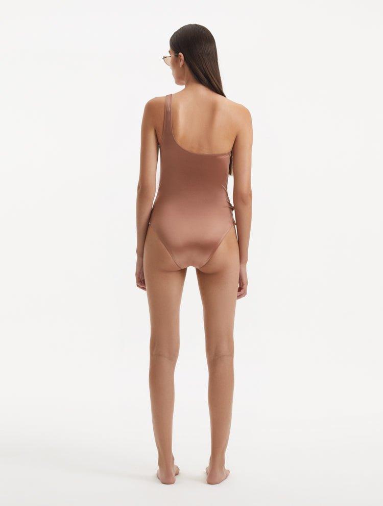 Back view of the Kaimana Brown Swimsuit, demonstrating the full bottom coverage and flattering fit