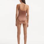 Back view of the Kaimana Brown Swimsuit, demonstrating the full bottom coverage and flattering fit