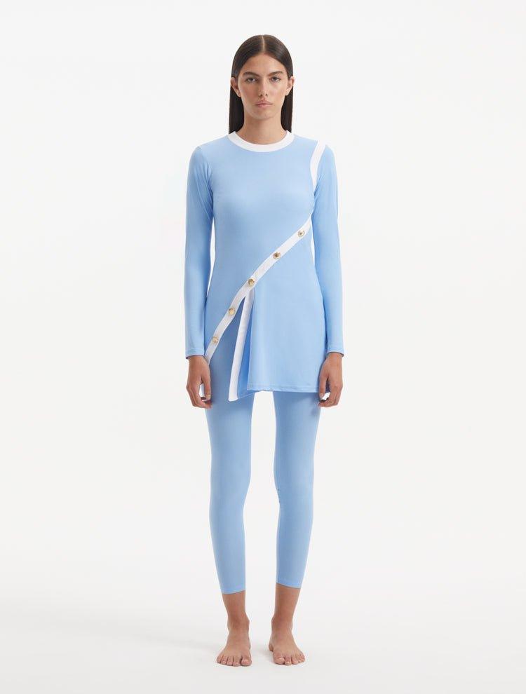 Model showcasing the Kamaria Baby Blue Burkini, highlighting the soft, celestial tones and easy pull-over design.