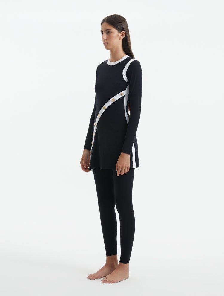 Side view of the Kamaria Black Burkini, focusing on the burkini's modest coverage and sleek design.