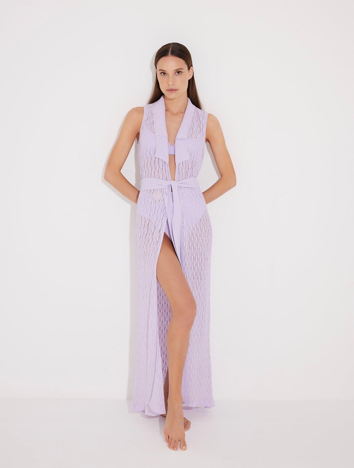 "Front view of a model in the Kariba Lilac Kaftan, displaying the ribbed collar and layered neckline."