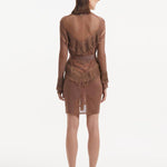 "Back view of the Kenga Brown Kaftan, emphasizing the knee-length design and the flowing fringe details."