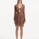 "Model showcasing the Kenga Brown Kaftan from the front, highlighting the knee-length cut, hand-knitted openwork pattern, and fringe detailing."