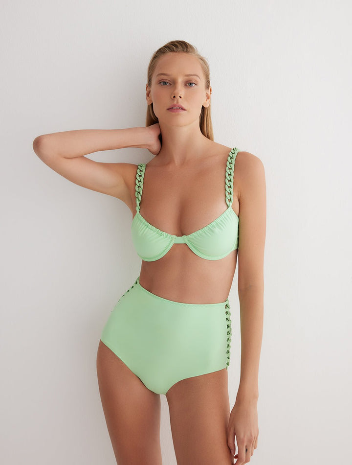 Front View: Model in Kerstin Mint Green Bikini Bottom - MOEVA Luxury Swimwear, High Rise, ABS Chain Straps on Sides, Moderate Bottom Coverage, MOEVA Luxury Swimwear
